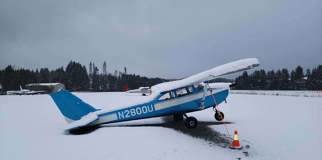 Cessna 172 with fresh snow weighing down the tail