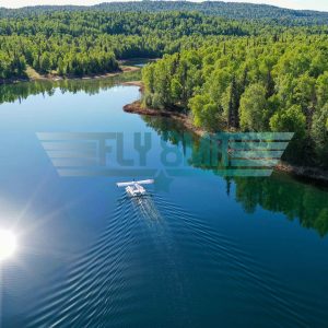 seaplane taxing on lake