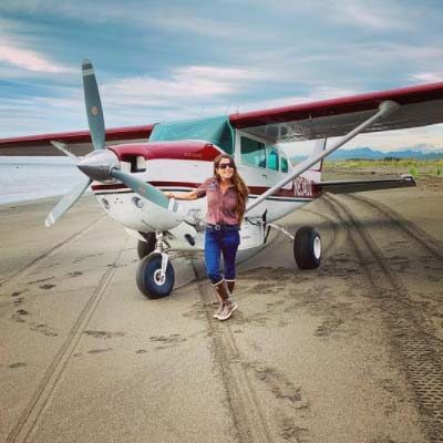 flight instructor in front of airplane